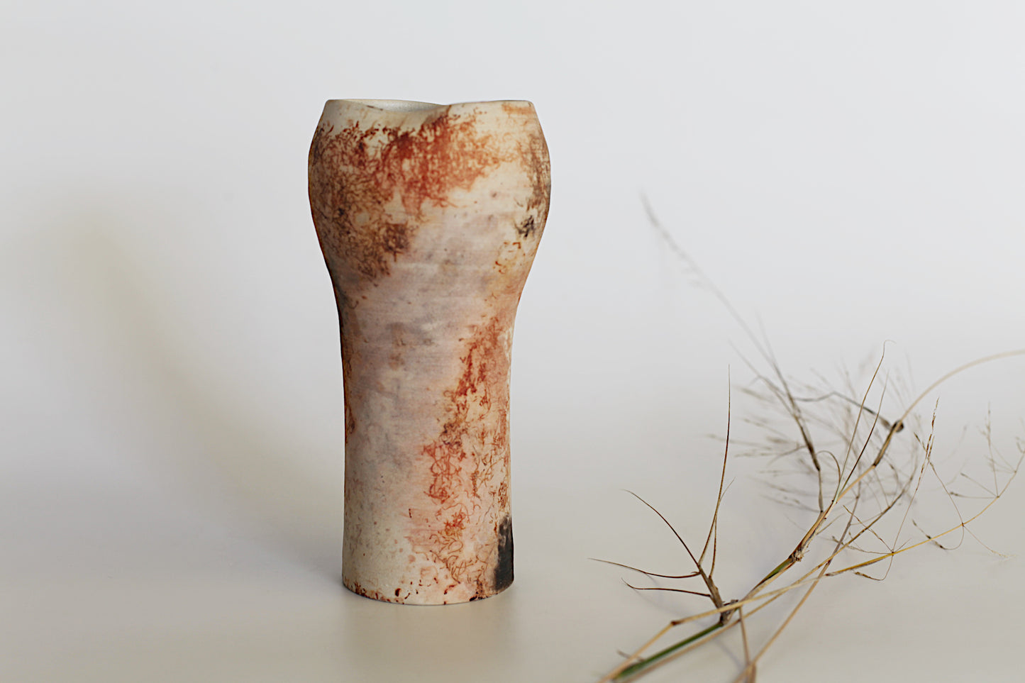 Pit fired vessel with altered opening - one of a kind