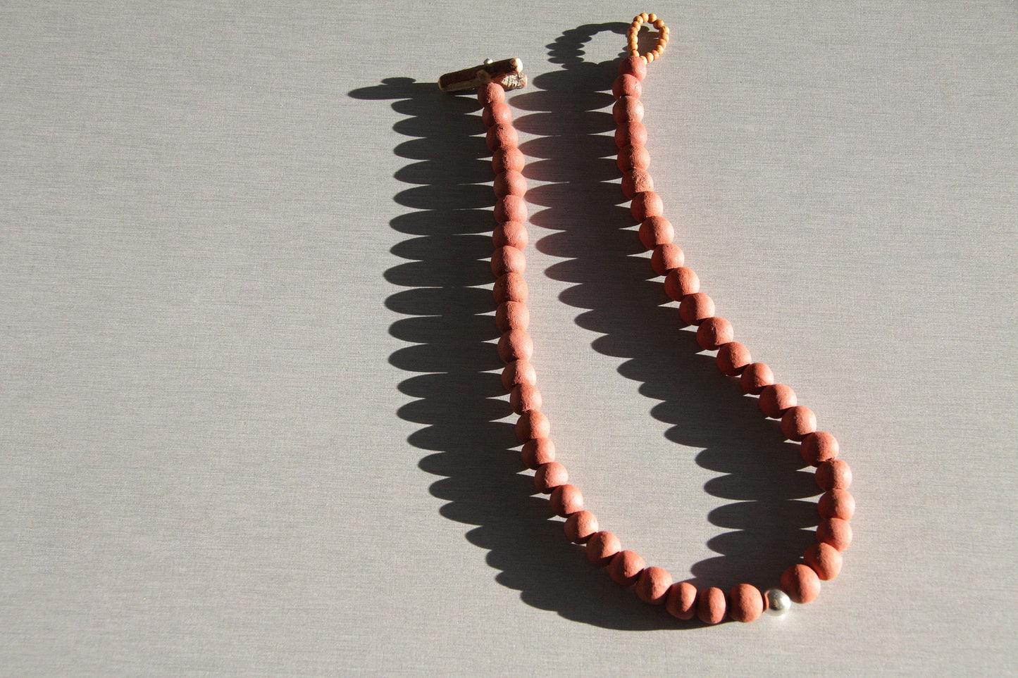 I am - ceramic necklace with a single sterling silver bead - made to order