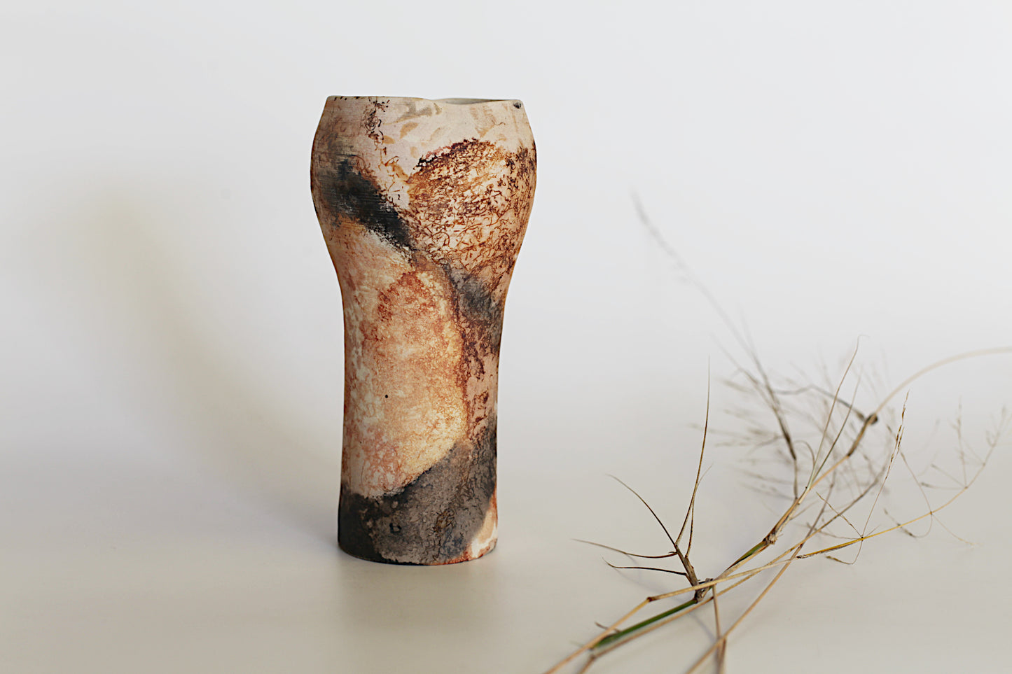 Pit fired vessel with altered opening - one of a kind