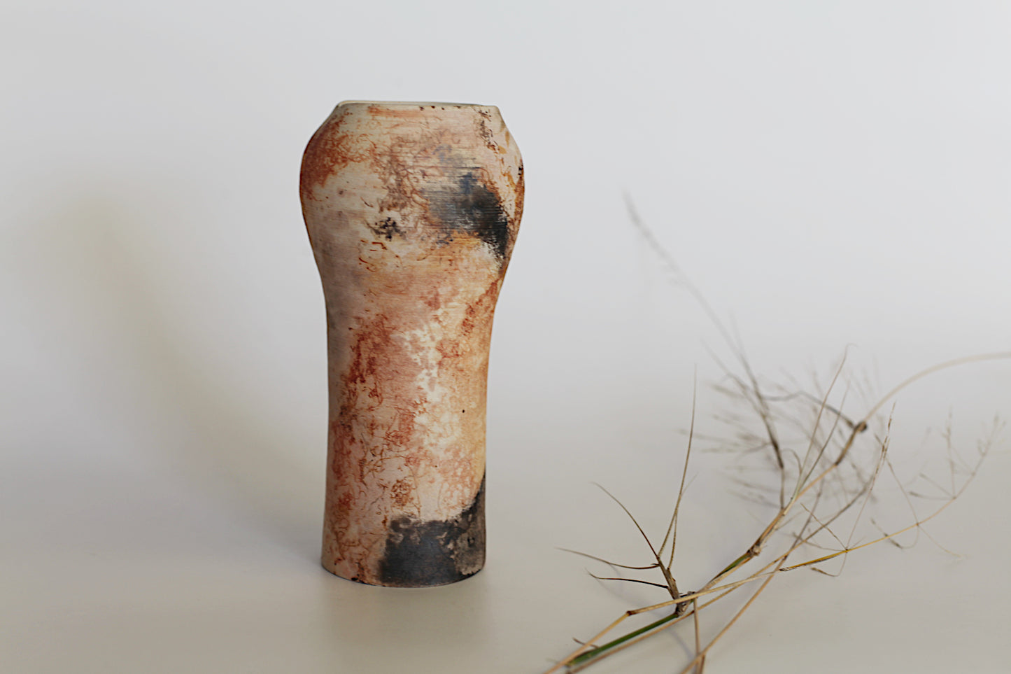 Pit fired vessel with altered opening - one of a kind