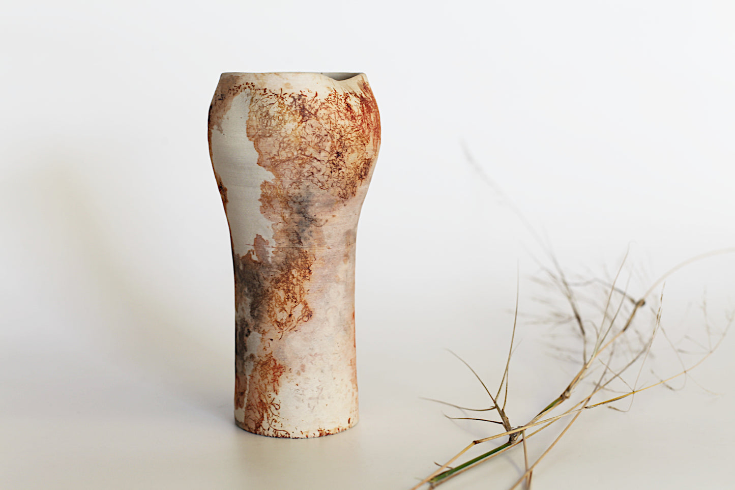 Pit fired vessel with altered opening - one of a kind