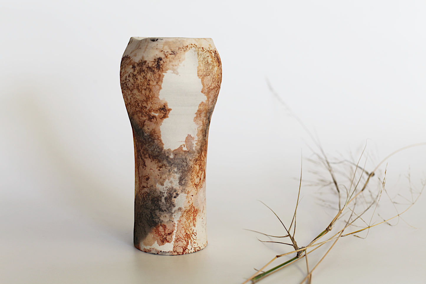 Pit fired vessel with altered opening - one of a kind