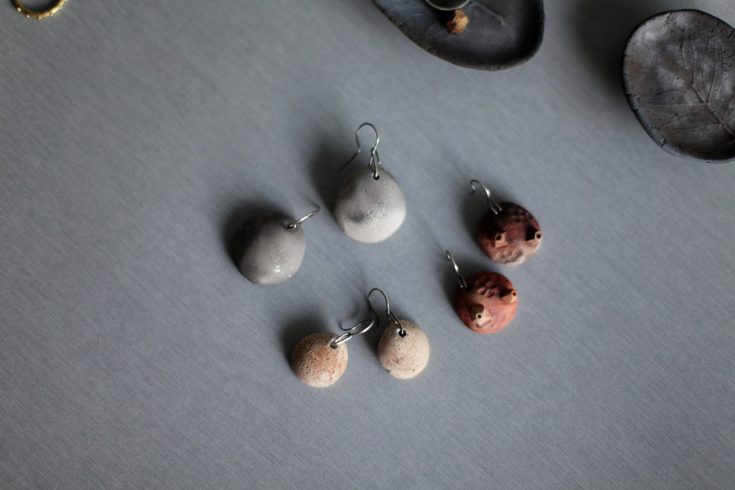 Barnacles - hand sculpted ceramic pit fired earrings - raised from